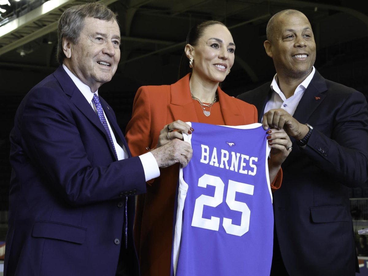 R. Gerald Turner and Damon Evans introduce the new head women’s basketball coach Adia Barnes to the Hilltop at a press conference in Moody Coliseum.